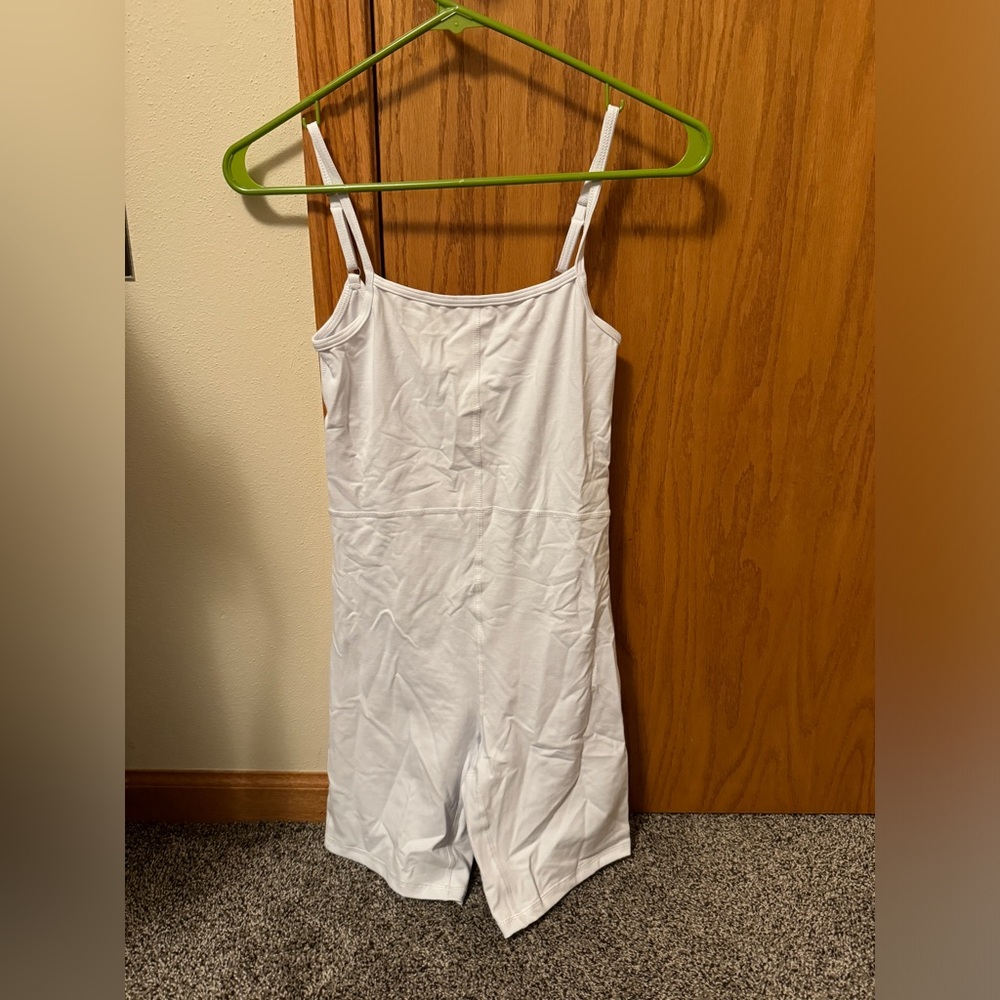 white athletic jump suit size xs